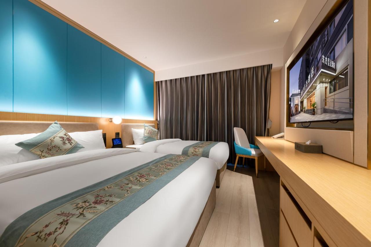 East Sacred Hotel: Tiananmen Square Proximity with Tourism Services Beijing Exterior photo Deluxe Room